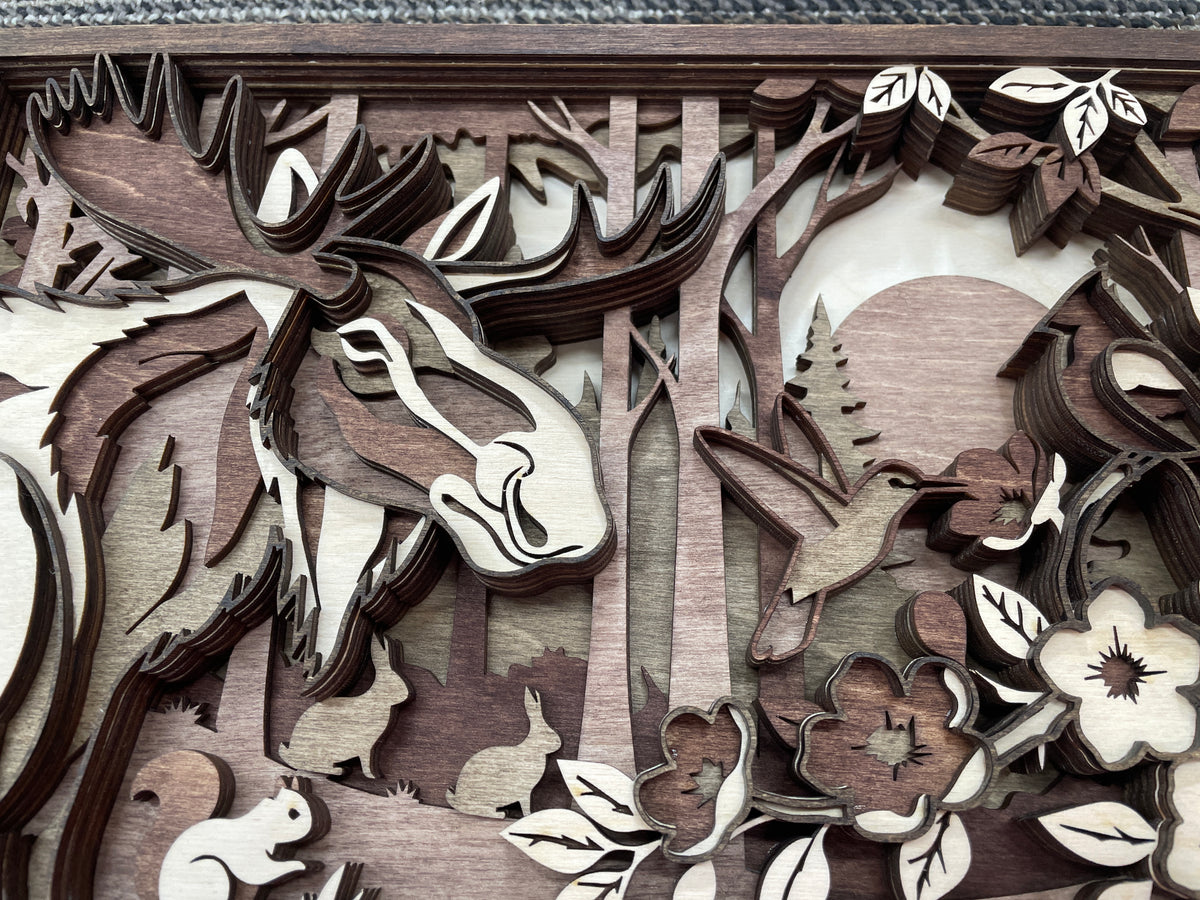 Handcrafted Moose in Forest Scene