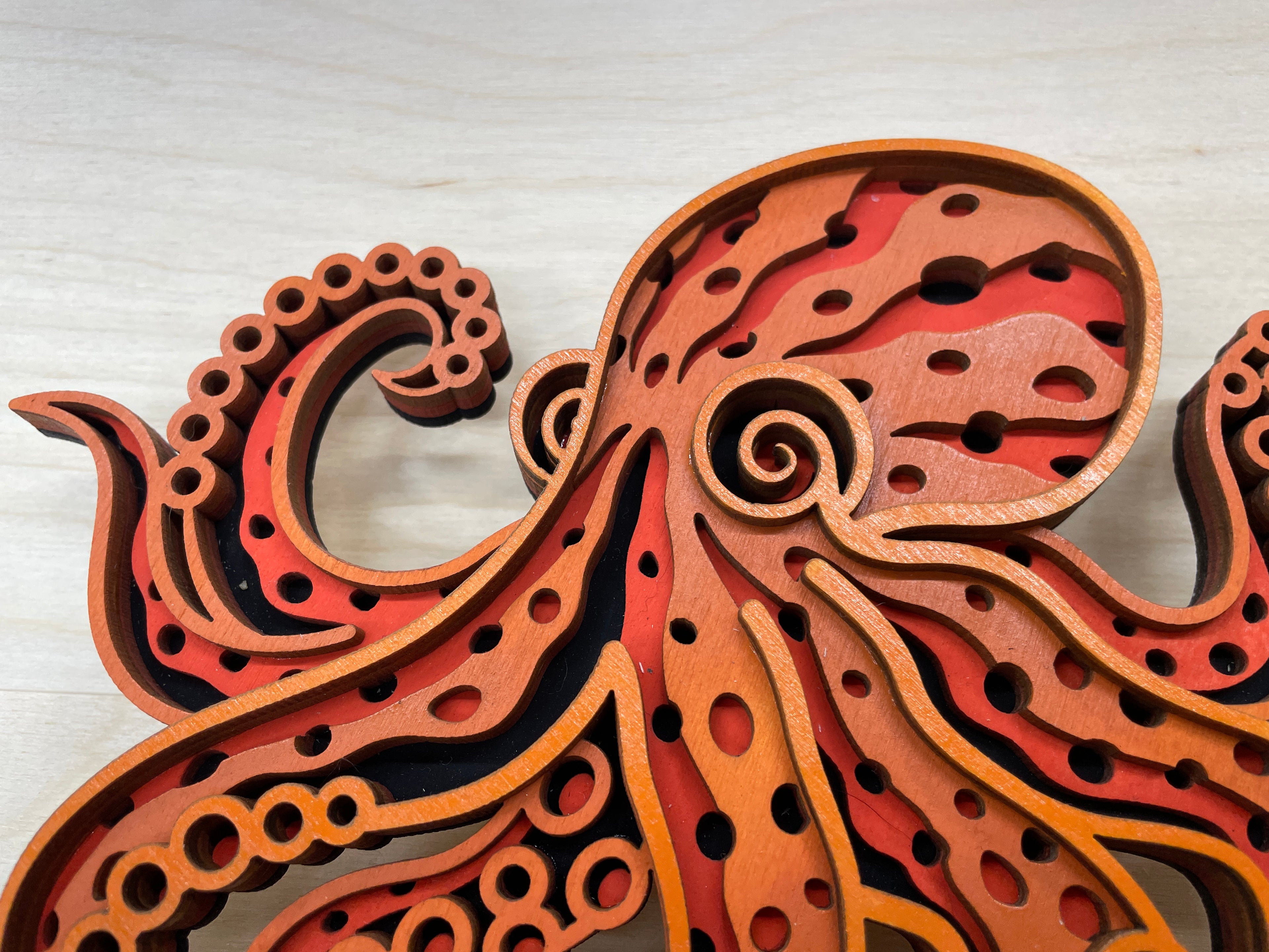 Multi-layered laser-cut octopus