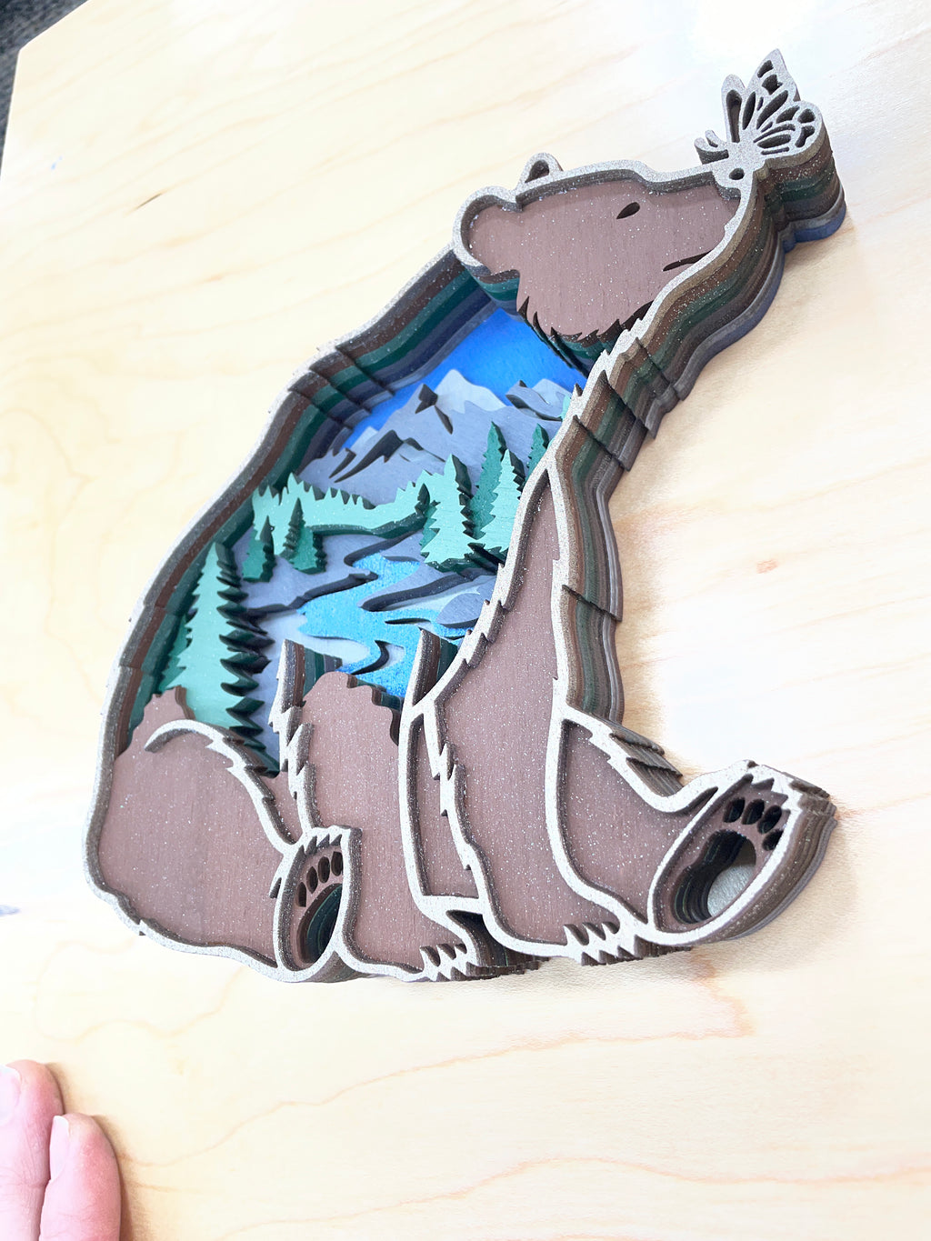 Bear with butterfly