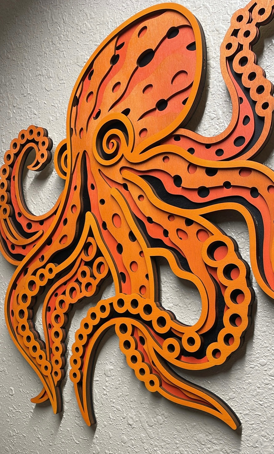 Multi-layered laser-cut octopus